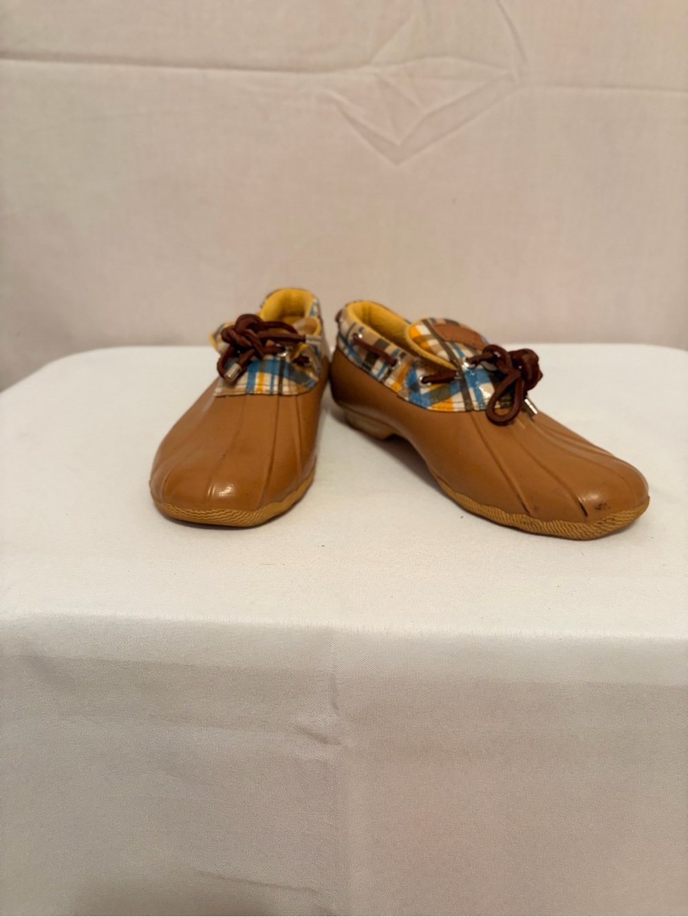 Sperry Top-Sider waterproof duck rain shoes with yellow plaid pattern.